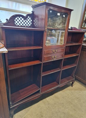 Lot 649 - A mahogany display unit, the centre section...