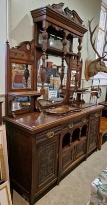 Lot 651 - A large antique oak mirror back sideboard, the...