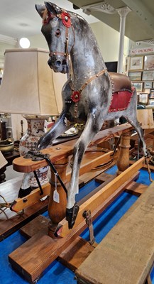 Lot 680 - A vintage childs rocking horse mounted to a...