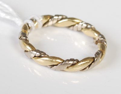 Lot 83 - A two-colour 18ct gold ring, 3.2 grams.