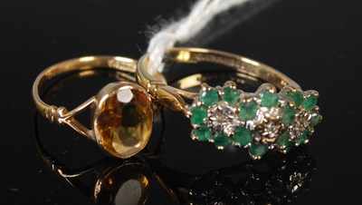 Lot 85 - A 9ct gold, emerald and diamond chip flower...