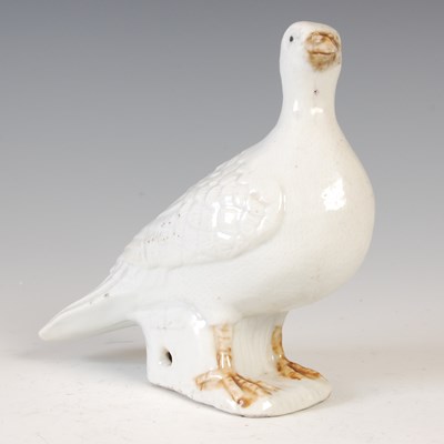 Lot 546 - A Chinese porcelain model of a dove, with...