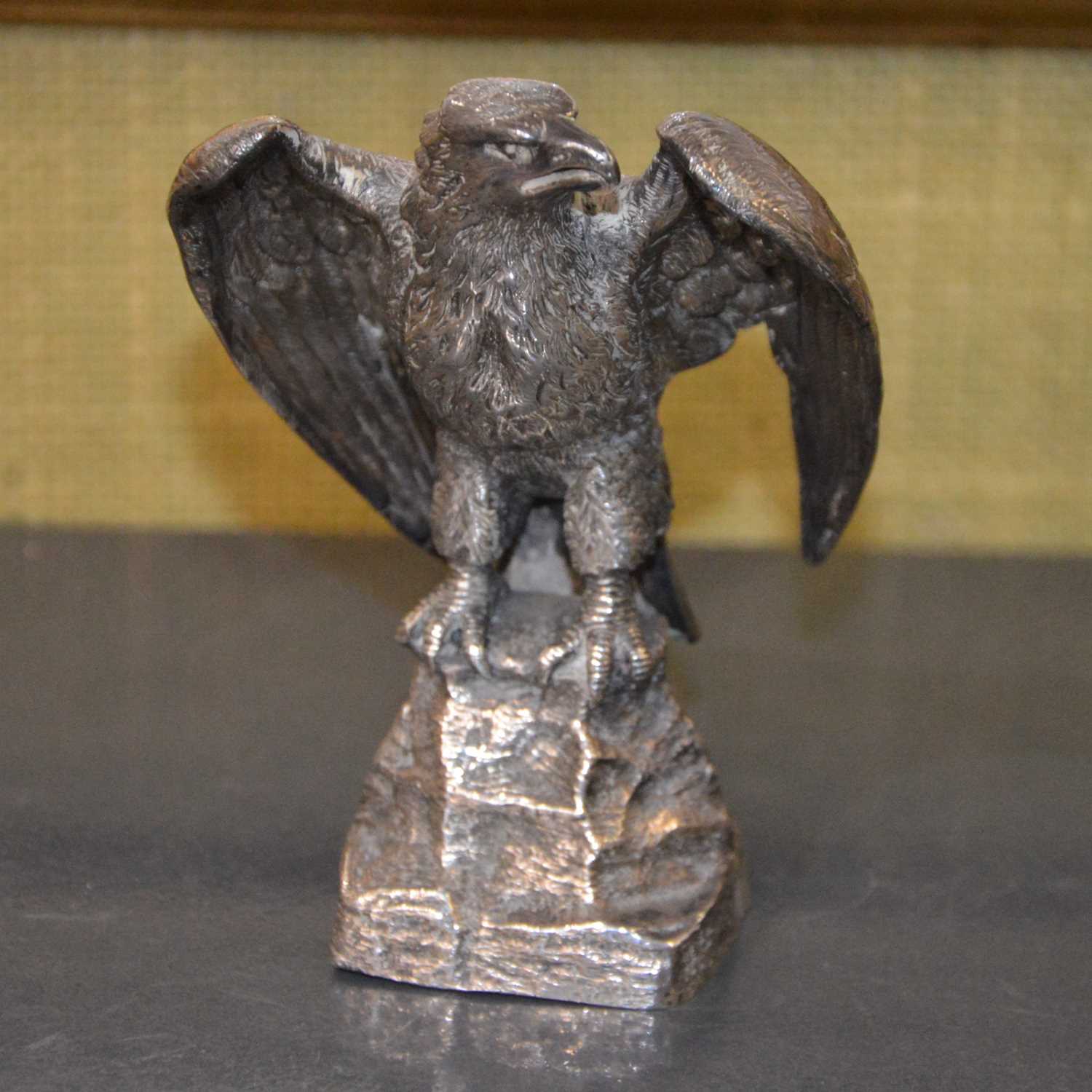 Lot 120 - A white metal model of an eagle, modelled...