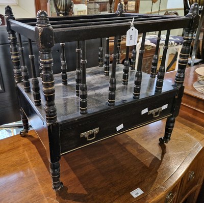 Lot 696 - A 19th century ebonised canterbury with single...