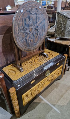 Lot 711 - A Chinese carved wooden blanket box, the...