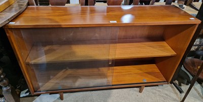 Lot 715 - A mid-century teak bookcase with two glazed...