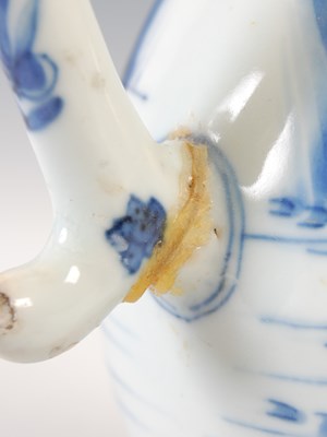 Lot 557 - A Chinese porcelain blue and white jug, Qing...
