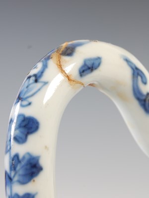 Lot 557 - A Chinese porcelain blue and white jug, Qing...
