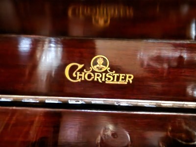 Lot 741 - An antique Chorister mahogany gramophone,...