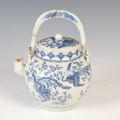 Lot 559 - A Chinese blue and white porcelain tea kettle...