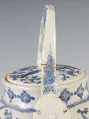 Lot 559 - A Chinese blue and white porcelain tea kettle...