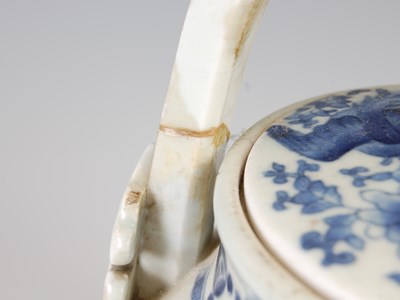 Lot 559 - A Chinese blue and white porcelain tea kettle...