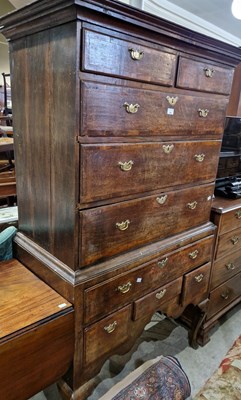 Lot 745 - A George III oak chest on stand, the upper...