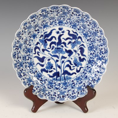 Lot 564 - A Chinese porcelain blue and white flower...