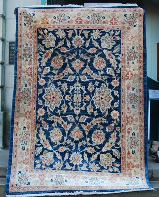 Lot 861 - A Ziegler type blue ground rug, 20th century,...