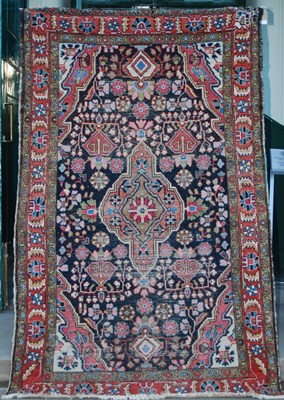 Lot 881 - A Persian rug, early 20th century, the...