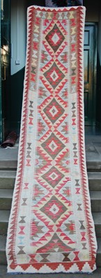 Lot 871A - A Persian Kilim runner, 20th century, the sand...