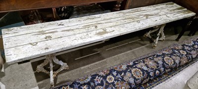 Lot 770 - An antique white painted cast metal garden...