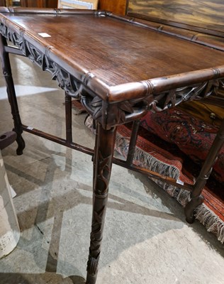 Lot 571 - A Chinese dark wood gaming table, Qing Dynasty,...