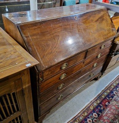 Lot 787 - A George III mahogany bureau, the fall-front...