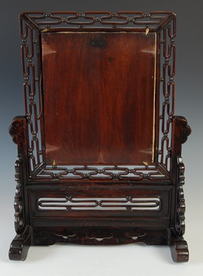 Lot 575 - A Chinese dark wood table screen, late Qing...