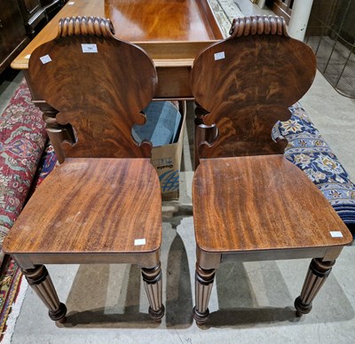 Lot 791 - A pair of 19th century mahogany hall chairs,...