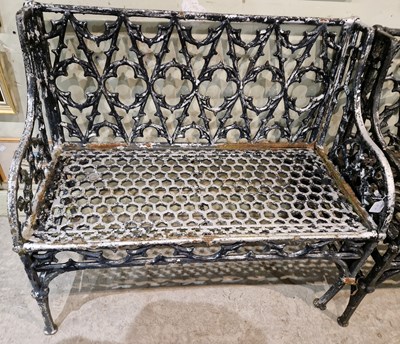 Lot 792 - A late 19th century cast iron bench of gothic...