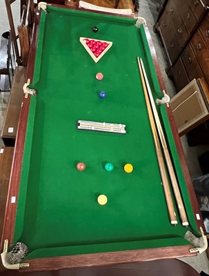 Lot 733A - A snooker table with foldable legs, balls,...