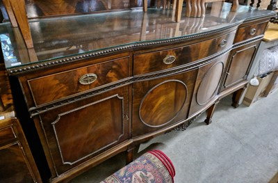 Lot 798 - A 20th century mahogany bowfront sideboard...