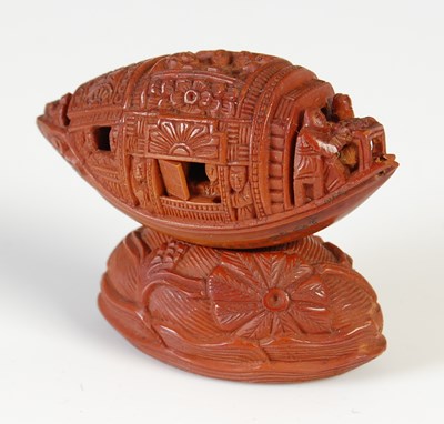 Lot 577 - A finely carved Chinese coquilla nut, Qing...