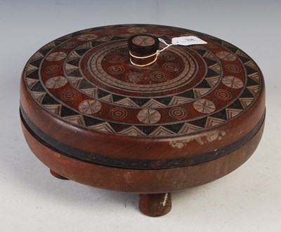 Lot 338 - Tribal Art - An African carved wood circular...