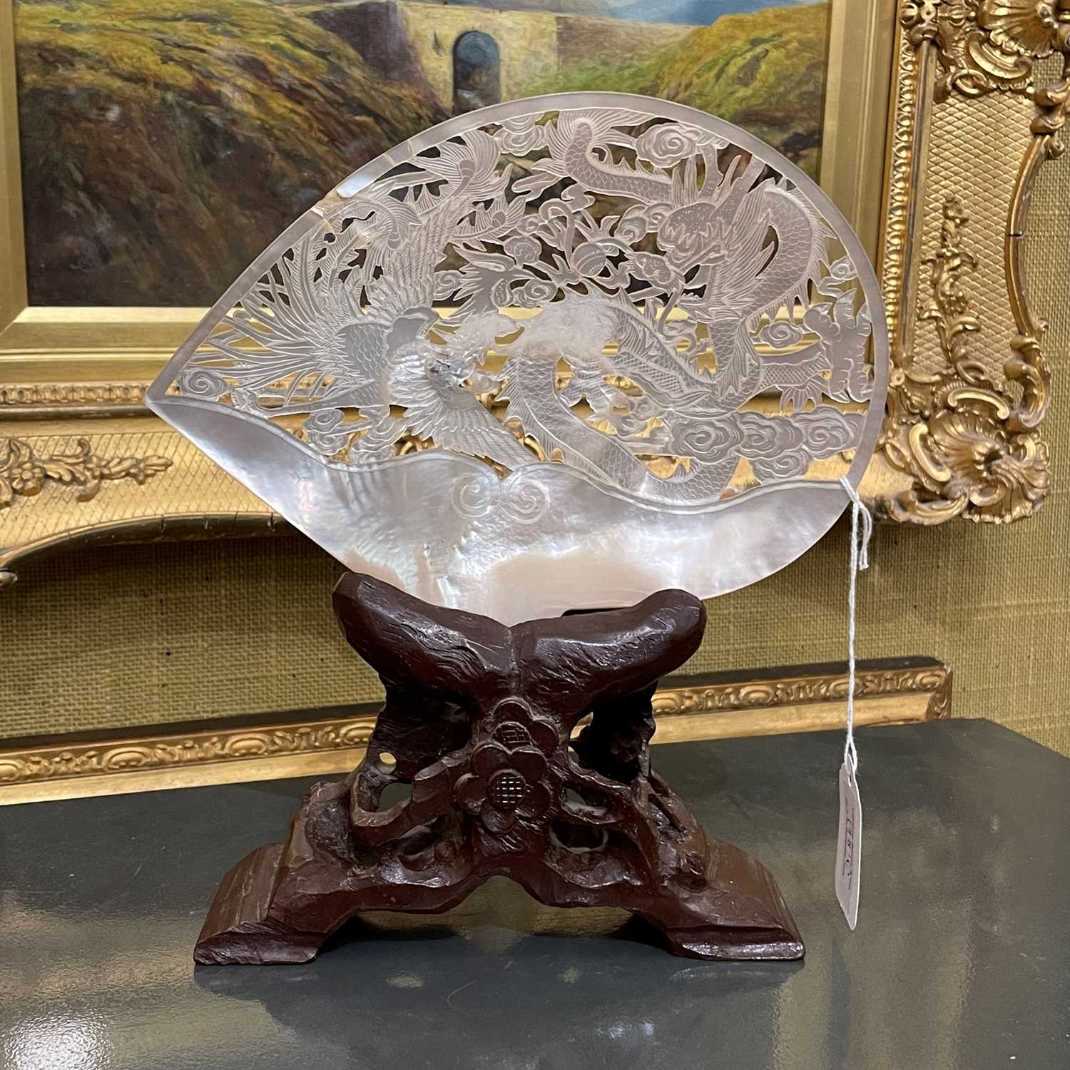 Lot 198 - A Chinese carved and pierced abalone shell,...