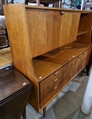 Lot 813 - A mid-century teak side cabinet by 'Austin...