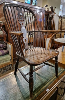 Lot 824 - A 20th century elm Windsor arm chair, approx....