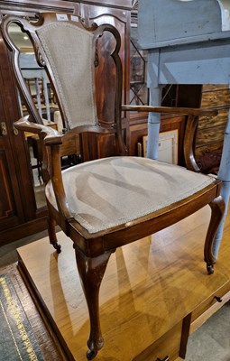 Lot 826 - An Edwardian mahogany elbow chair with brass...