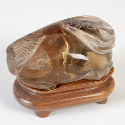 Lot 579 - A Chinese rock crystal carving of a Shishi dog,...