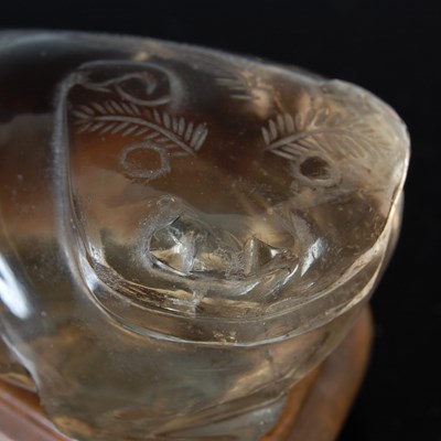 Lot 579 - A Chinese rock crystal carving of a Shishi dog,...