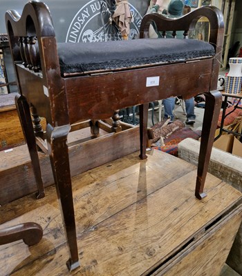 Lot 835 - An antique mahogany piano stool.