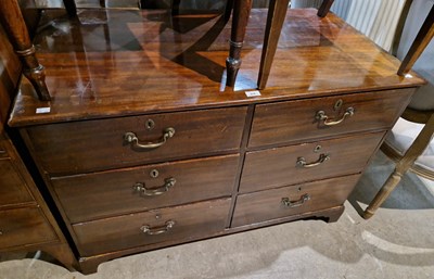 Lot 816 - A George III style mahogany chest of six short...