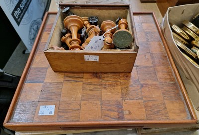Lot 245 - An early 20th century wooden draughts board...