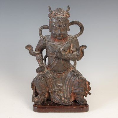 Lot 582 - A Chinese bronze figure of Wudi, modelled...