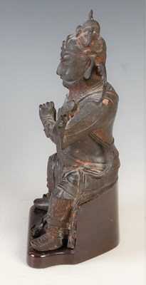 Lot 582 - A Chinese bronze figure of Wudi, modelled...