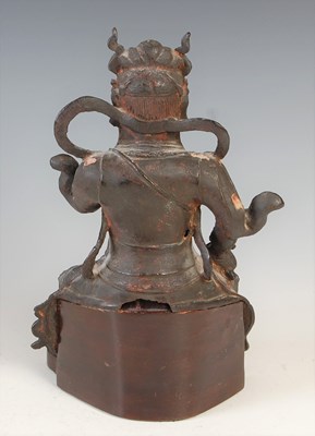 Lot 582 - A Chinese bronze figure of Wudi, modelled...