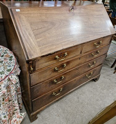 Lot 709 - A 19th century bureau, the fall front opening...