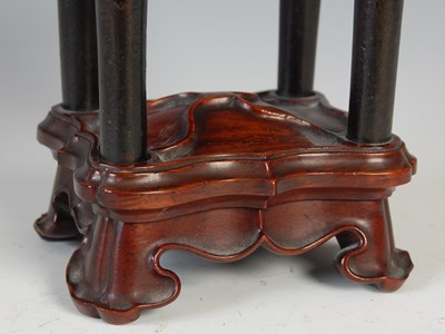 Lot 583 - A Chinese bronze archaic style Ding and wood...