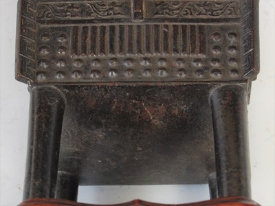 Lot 583 - A Chinese bronze archaic style Ding and wood...