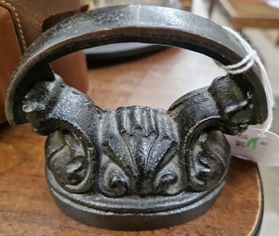 Lot 269 - An antique miniature cast iron iron.