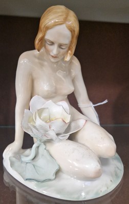 Lot 7 - An ENS porcelain figure of a nude female and...