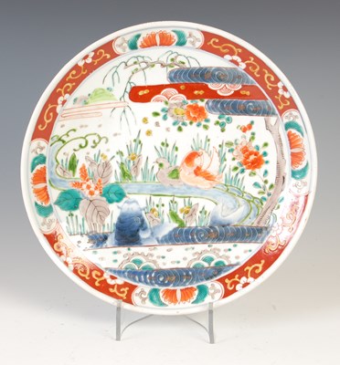 Lot 594 - A Japanese Imari porcelain charger, late 19th/...