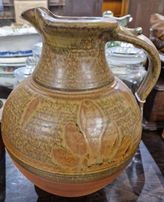 Lot 368 - A studio pottery pitcher, the underside with...